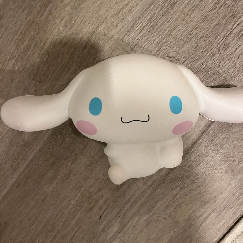 Adorable White Plush Doll with Blue and Pink Accents